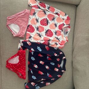 Two sets Carters girls rashguard sets